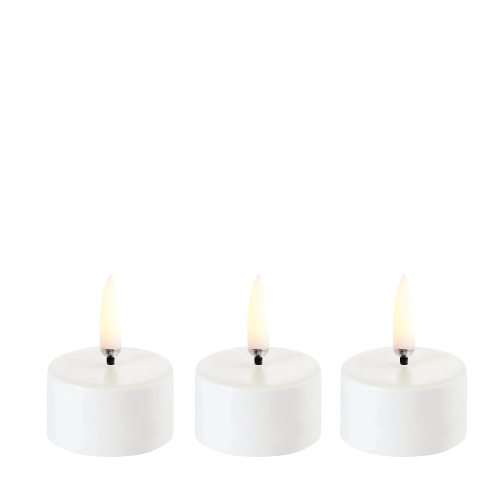 Minimalist White LED Candles for Elegant Interiors