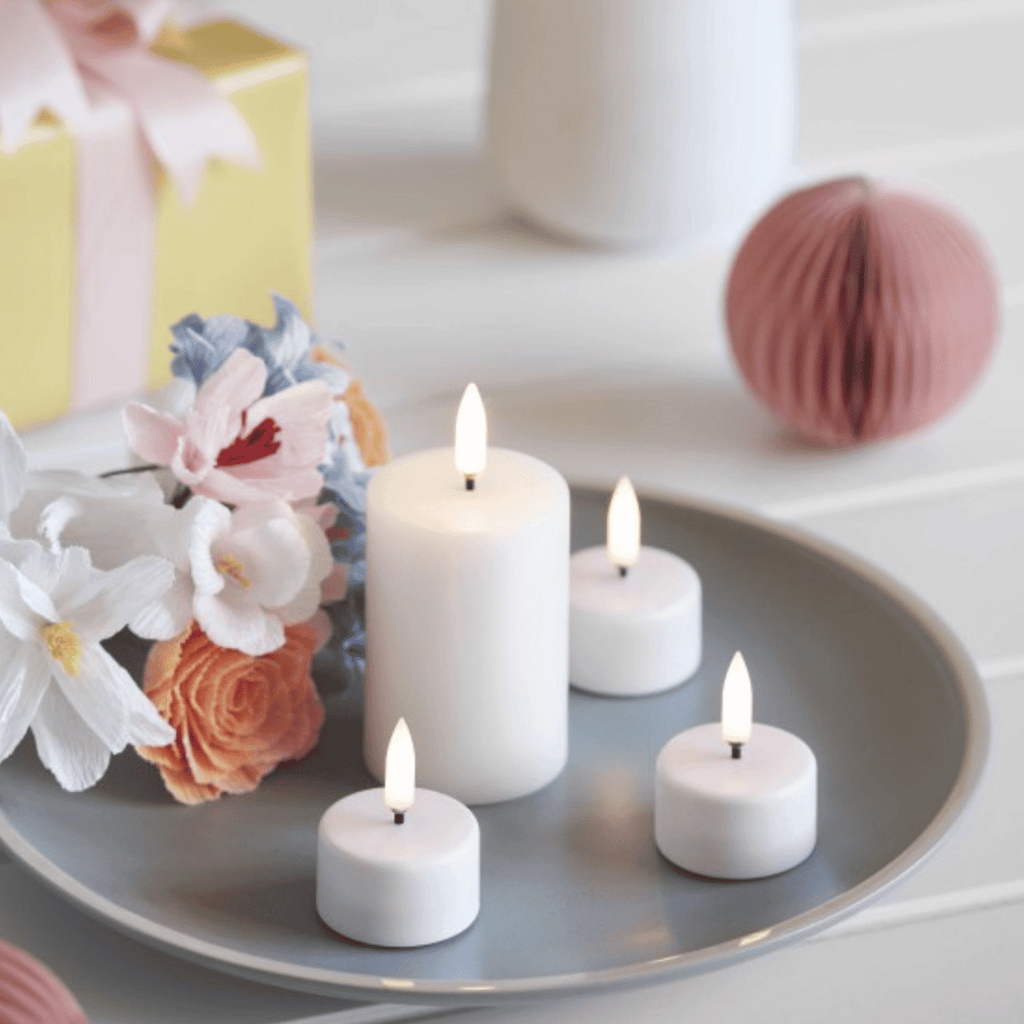 Minimalist White LED Candles for Elegant Interiors