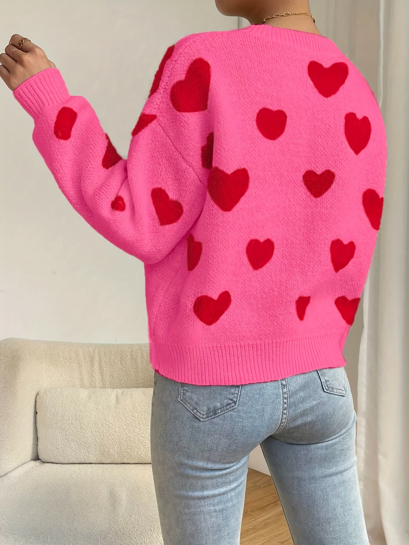 Sara | Pink Sweater Featuring Red Heart Design and Round Neckline