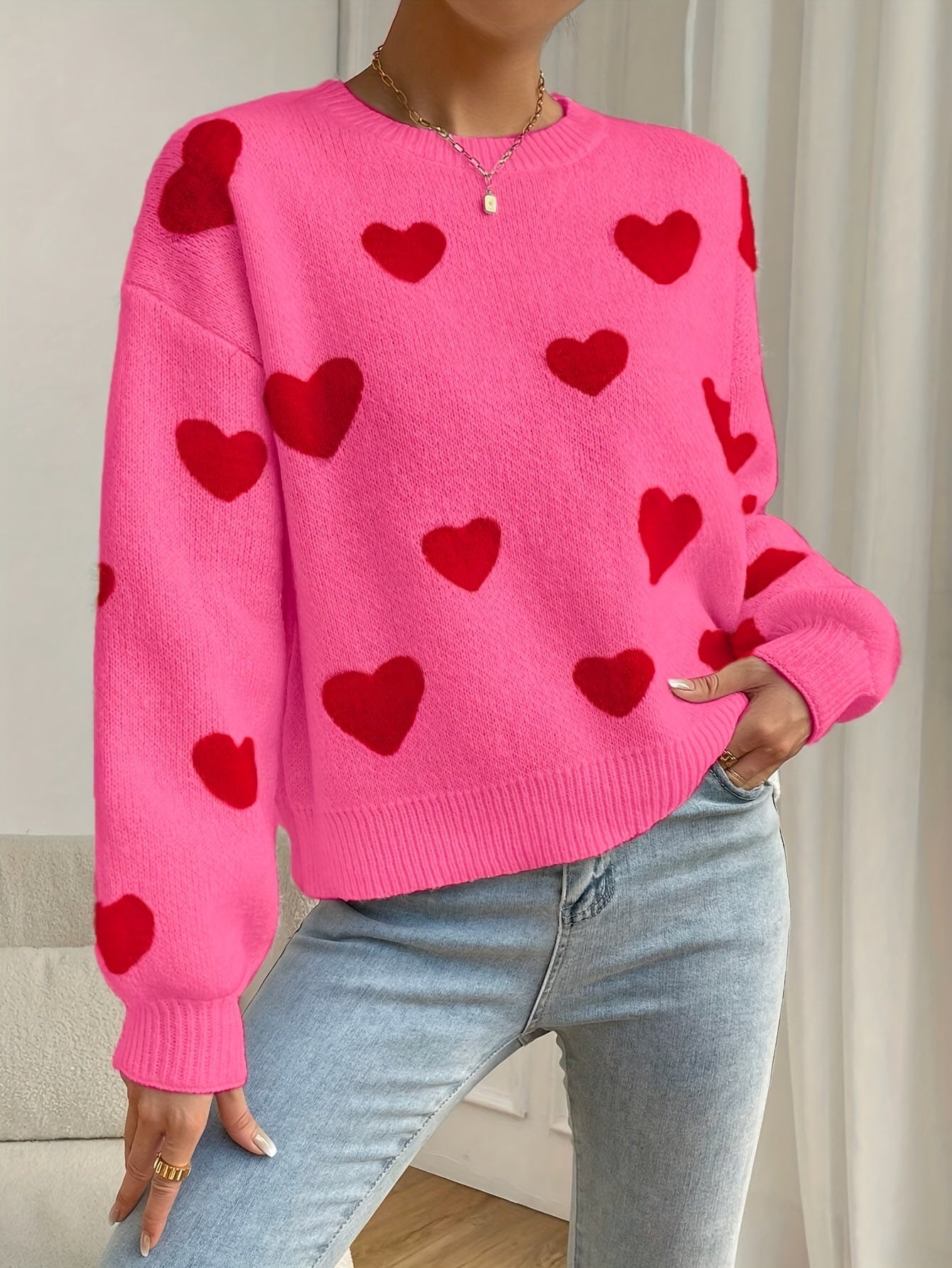 Sara | Pink Sweater Featuring Red Heart Design and Round Neckline
