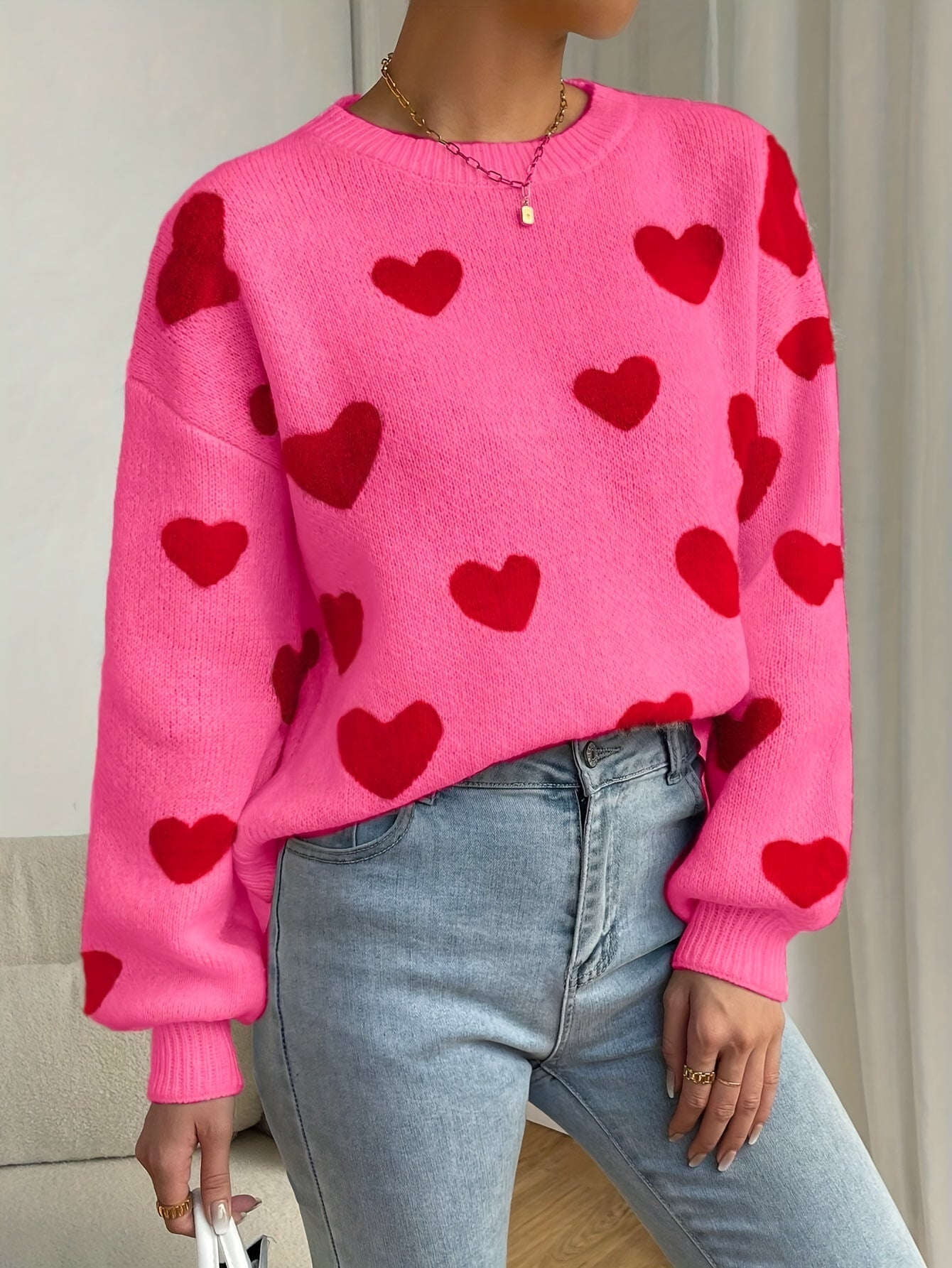 Sara | Pink Sweater Featuring Red Heart Design and Round Neckline