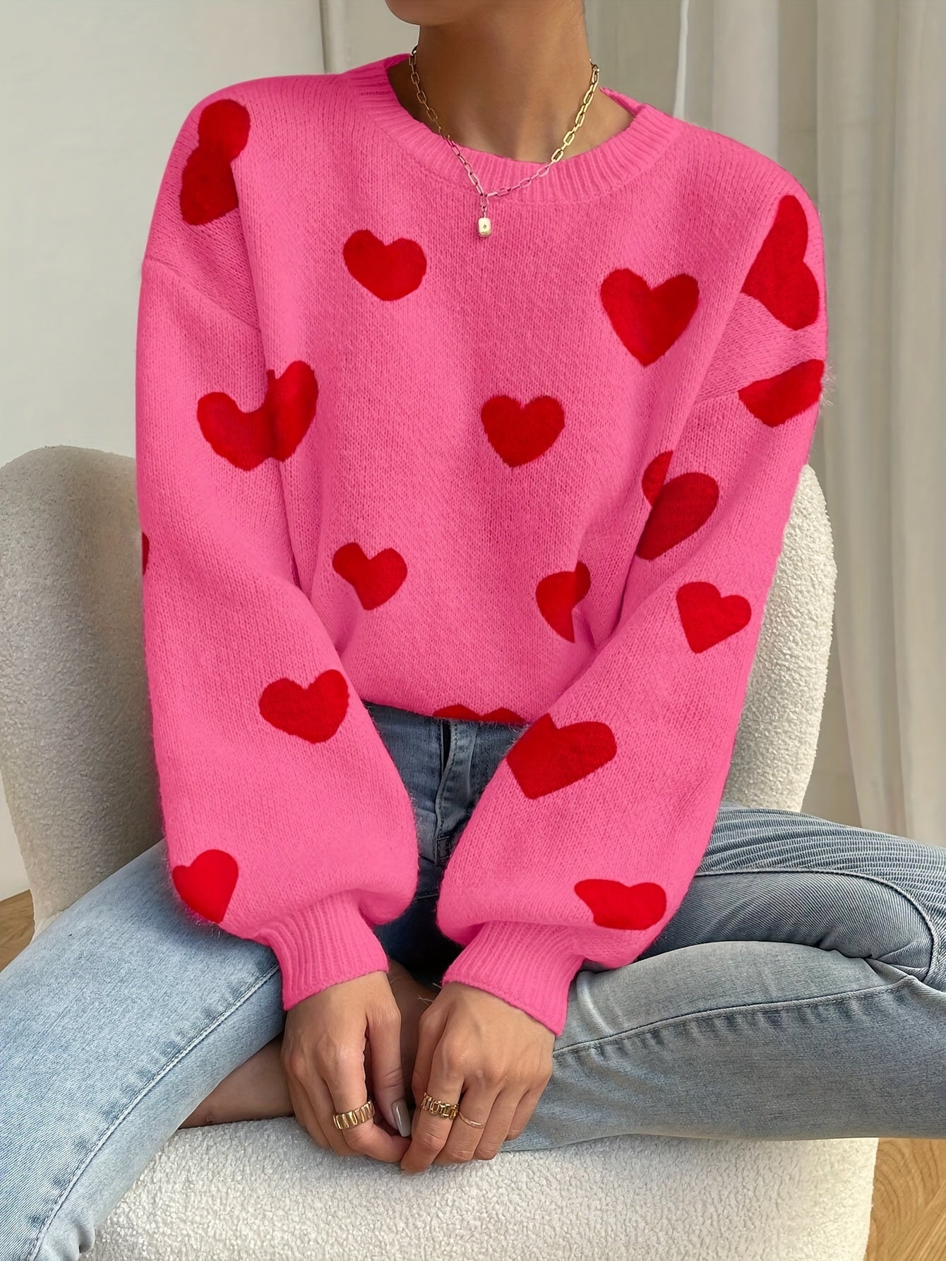 Sara | Pink Sweater Featuring Red Heart Design and Round Neckline